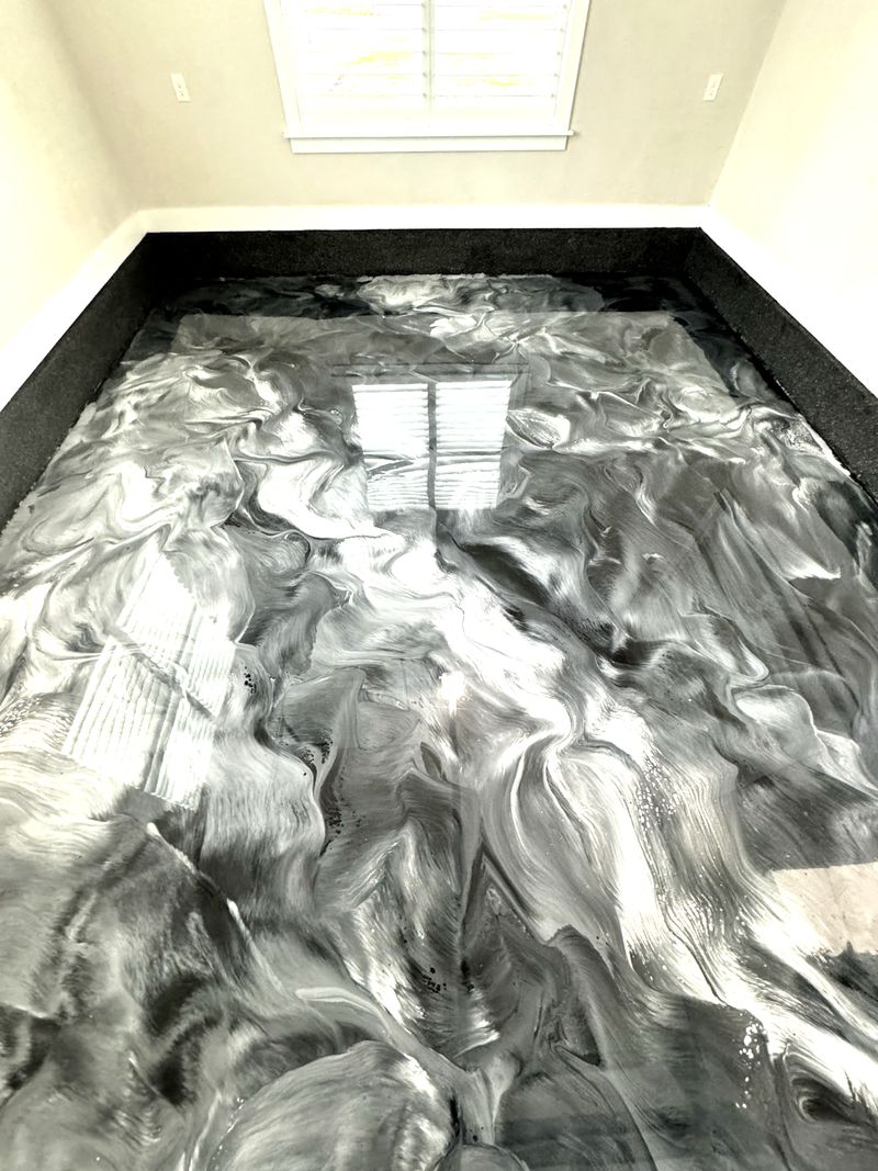 Black, white and silver metallic floor