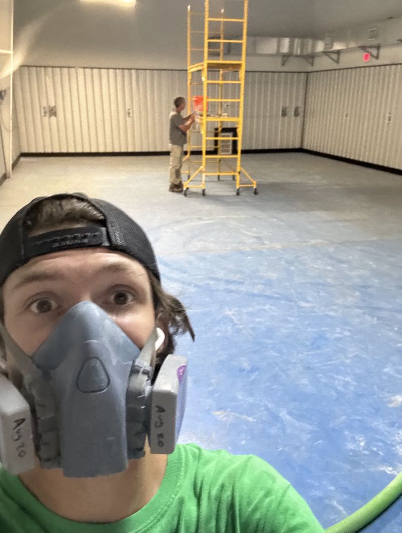 Karson on the job in a respirator